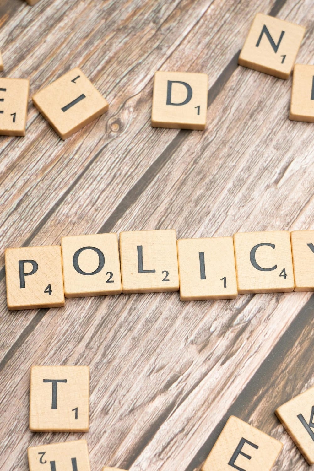 Photo by Markus Winkler: https://www.pexels.com/photo/the-word-policy-spelled-out-in-scrabble-letters-19783681/
