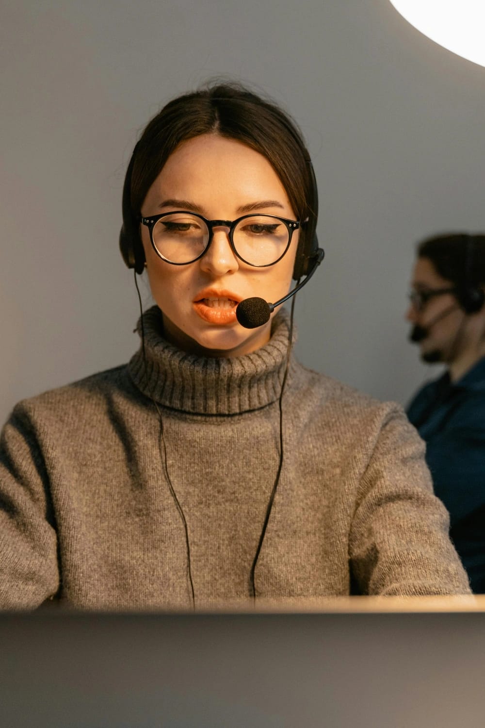 Photo by MART PRODUCTION: https://www.pexels.com/photo/woman-in-brown-sweater-wearing-black-framed-eyeglasses-7709151/
